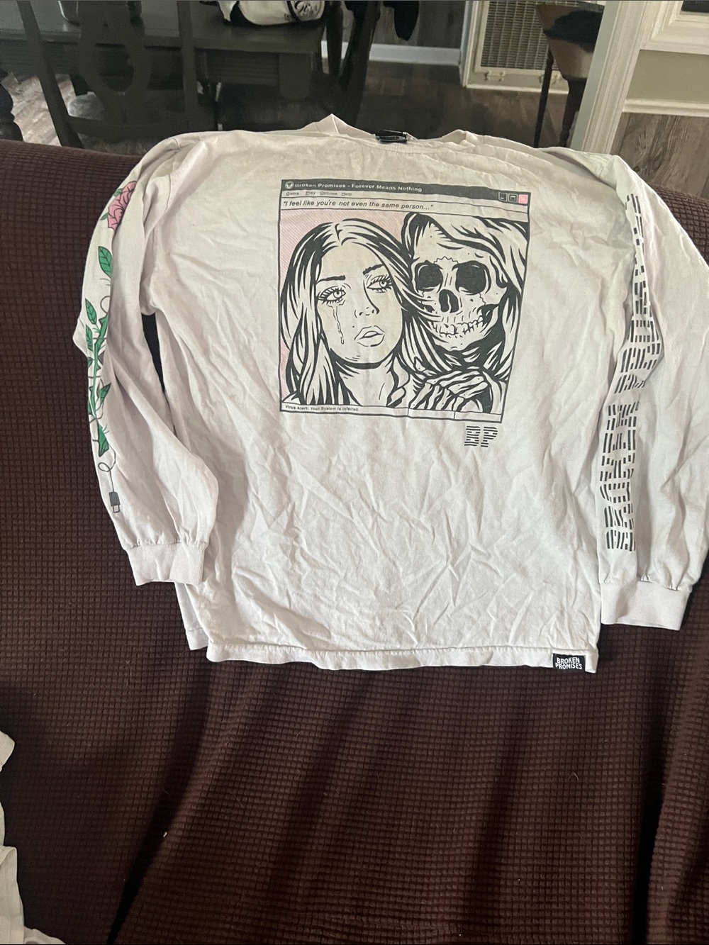 Graphic Long Sleeve Tee with Sketched Skull & Woman Broken Promises